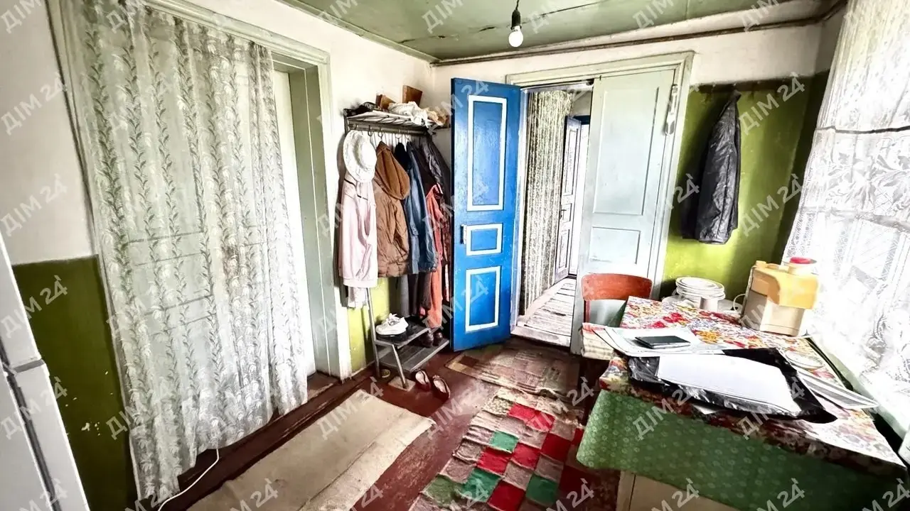 Будинок — .Новосанжарський р-н